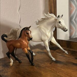 Breyer horse                           Elegant White and Brown Horse Figurines